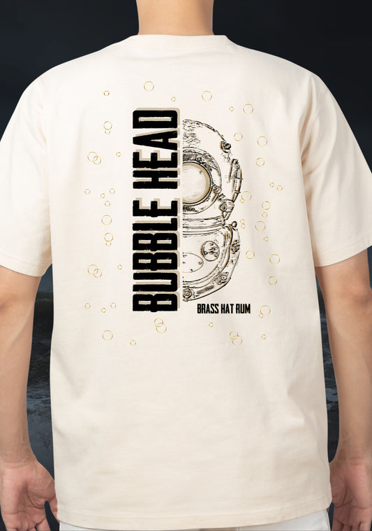Person wearing a white t-shirt with 'Bubble Head' and 'Brass Hat Rum' design on the back featuring a Siebe Gorman diver's helmet, all set against a dark and stormy seascape background