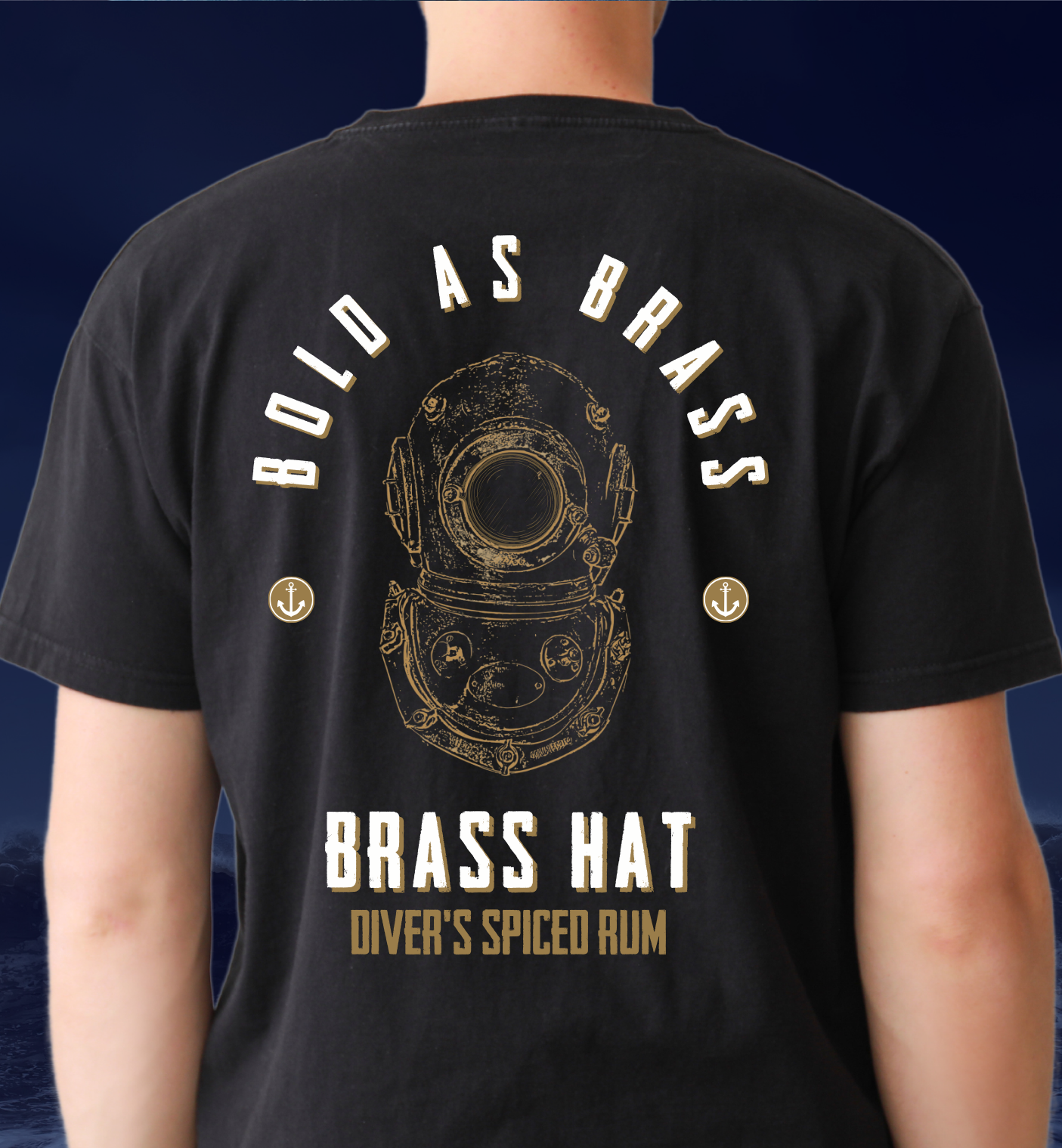 Back view of person wearing Brass Hat Diver’s Spiced Rum black ‘Bold As Brass’ t-shirt with deep sea diver helmet logo, anchor motifs, and brand name – divers’ gifts and ocean-inspired apparel