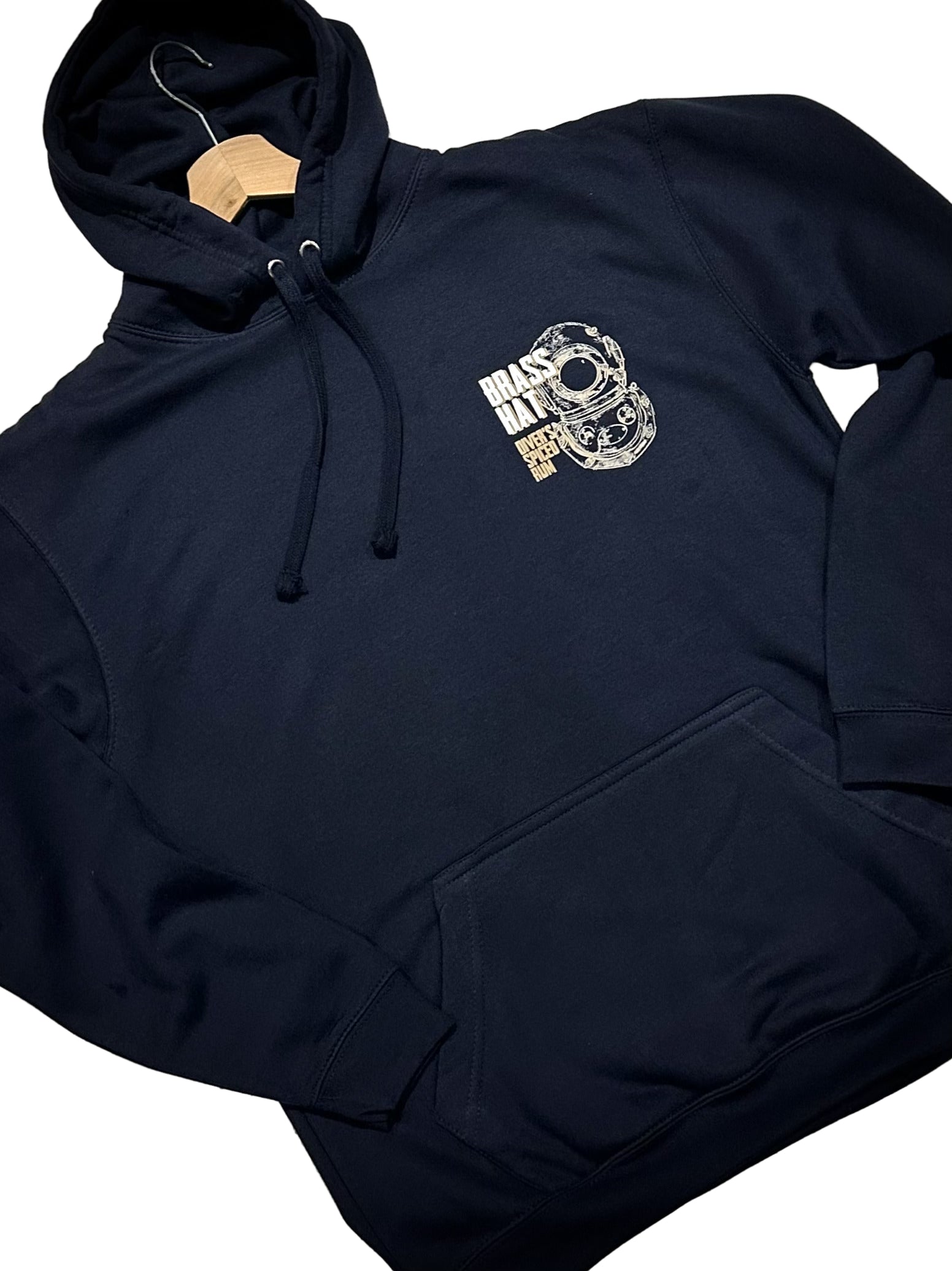 Front view of Brass Hat Diver’s Spiced Rum navy blue ‘Bold As Brass’ hoodie. Small diving helmet logo and brand name to front left chest– divers’ gifts and ocean-inspired apparel. White Background