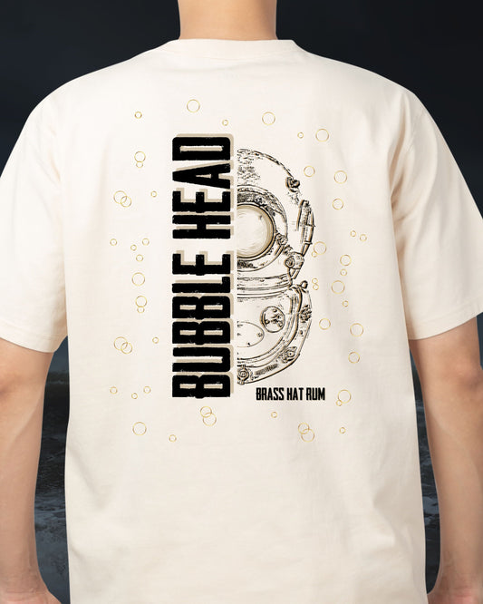 Person wearing Brass Hat Rum sand coloured ‘Bubble Head’ t-shirt.  Half Siebe Gorman diver helmet design & Bubble Head branding on the back – divers’ gifts and ocean-inspired apparel