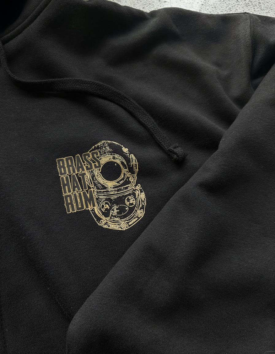 Front view of Nil Viz black hoodie with ‘Brass Hat Rum’ diving helmet logo – divers’ gifts and ocean-inspired apparel