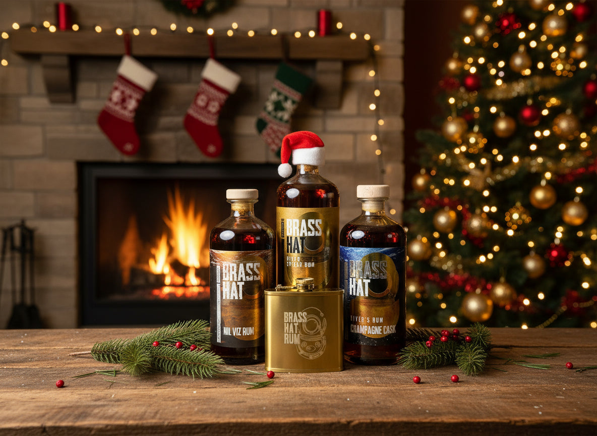 Brass Hat Rum gift set with three premium bottles and a branded hip flask — ideal Christmas gift for divers and rum enthusiasts.