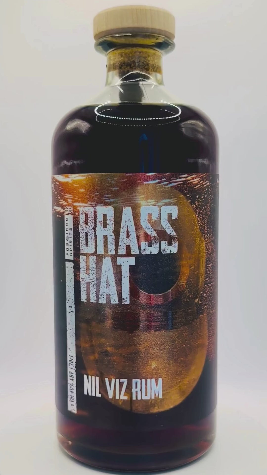 Rotating view of Brass Hat Nil Viz Rum bottle, highlighting handcrafted design and ideal gifting presentation