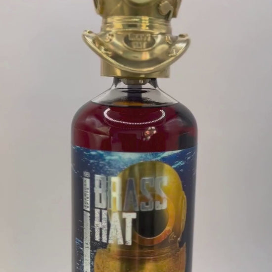 Showcase video of Brass Hat Diver's Helmet Bottle Topper rotating on a bottle of Brass Hat Diver's Champagne Cask Rum. Perfect Diver's Gift